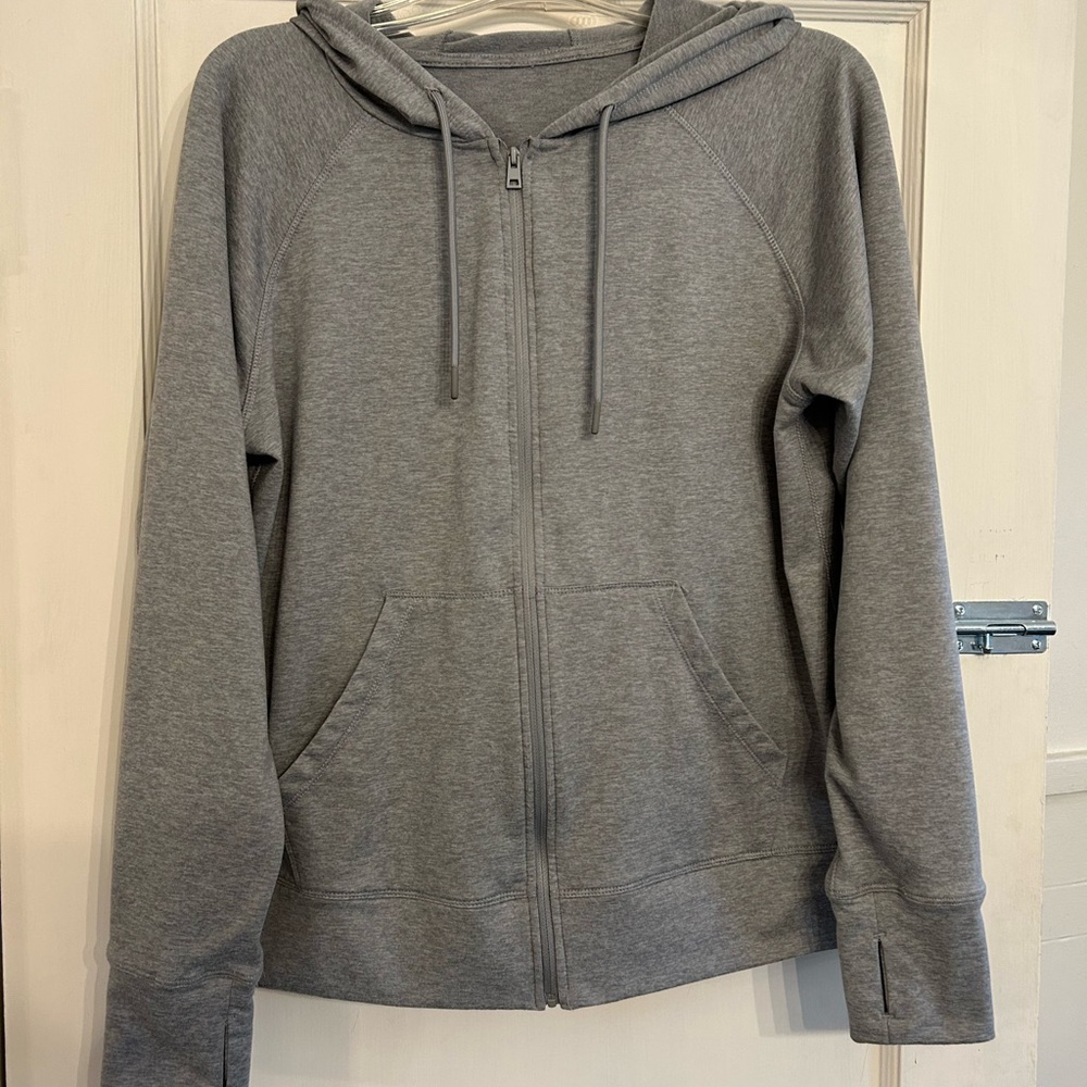 Fleece lined super soft Gray Zip-Up Hoodie. Tags removed but never worn.